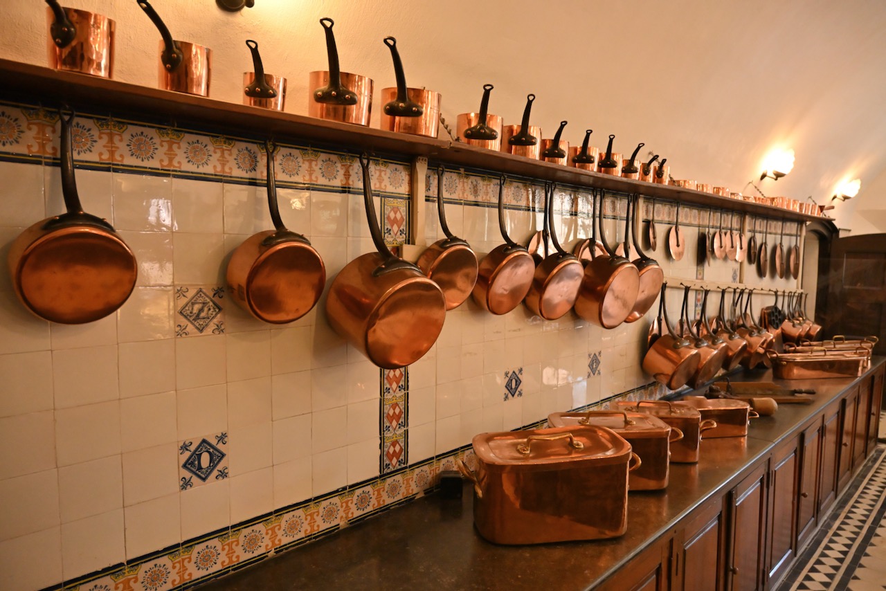 Kitchen with a lot of copper pots
